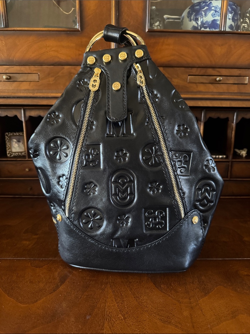 Marino Orlandi Black Leather Embossed Backpack with Gold Hardware